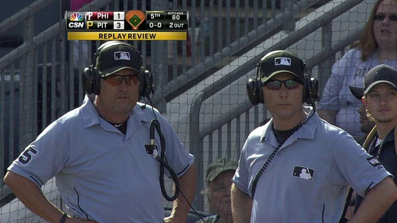 Call at first stands after Phils challenge in fifth