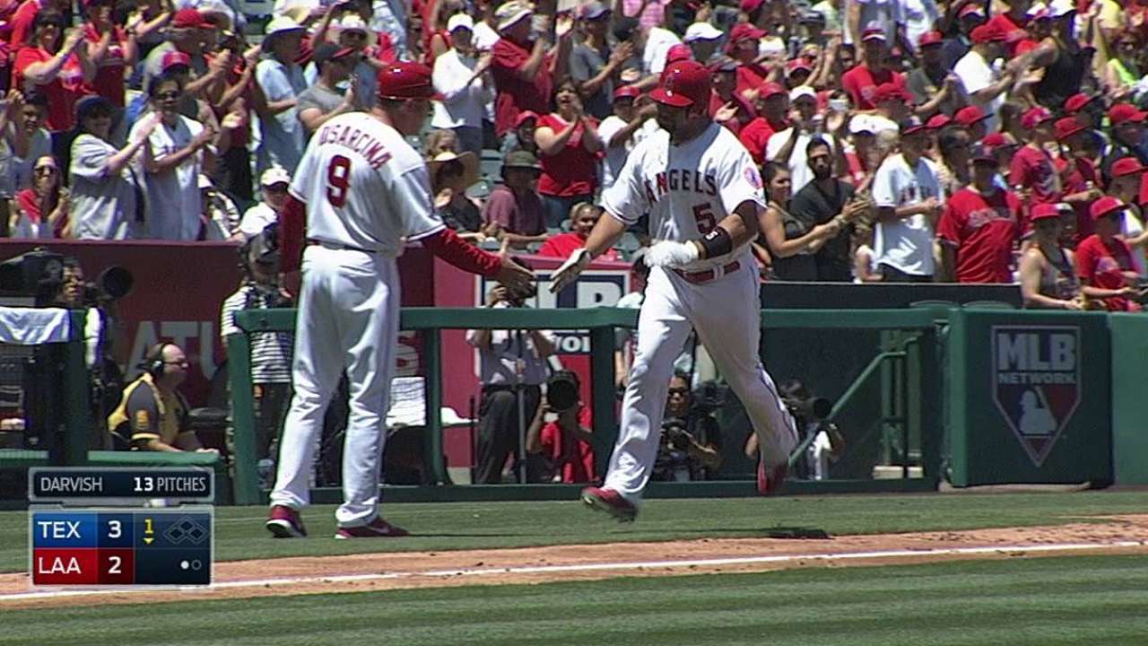 Pujols happy to DH in order to keep healthy