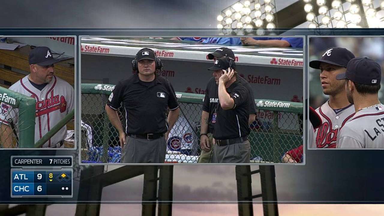 Overturned call at second goes Braves' way