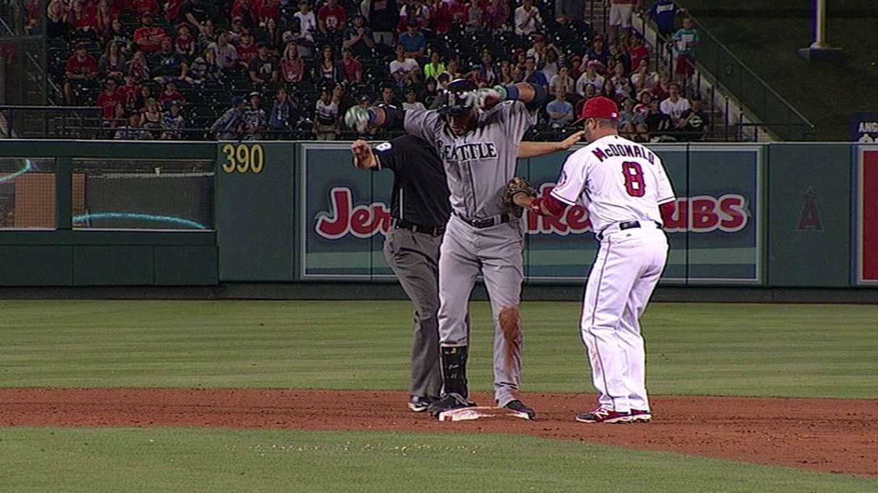 Angels benefit from pair of extra-inning challenges