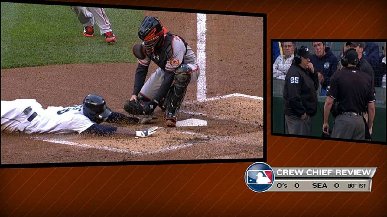 Out call stands on review of plate-collision rule