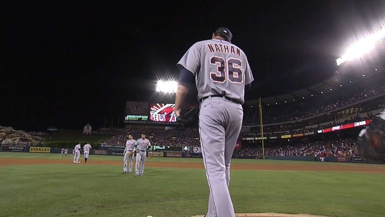 Nathan leans on sharp slider to strike out side