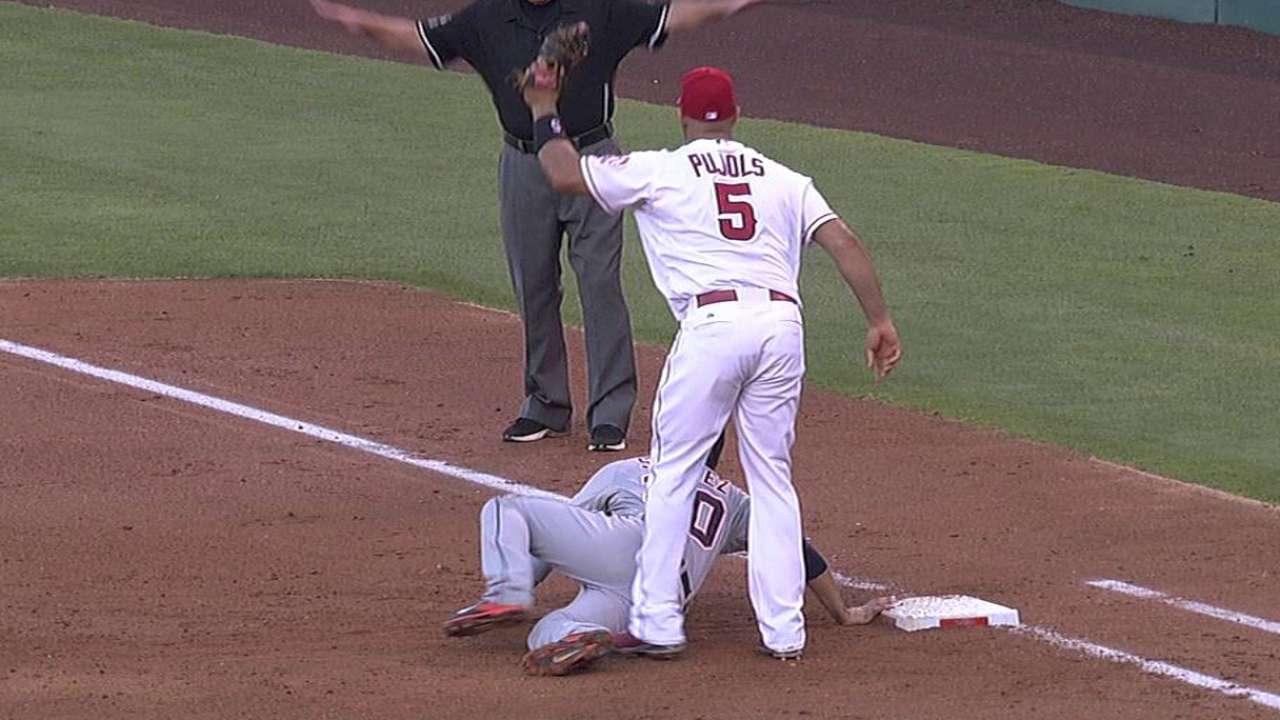 Scioscia wins challenge, Ausmus ejected