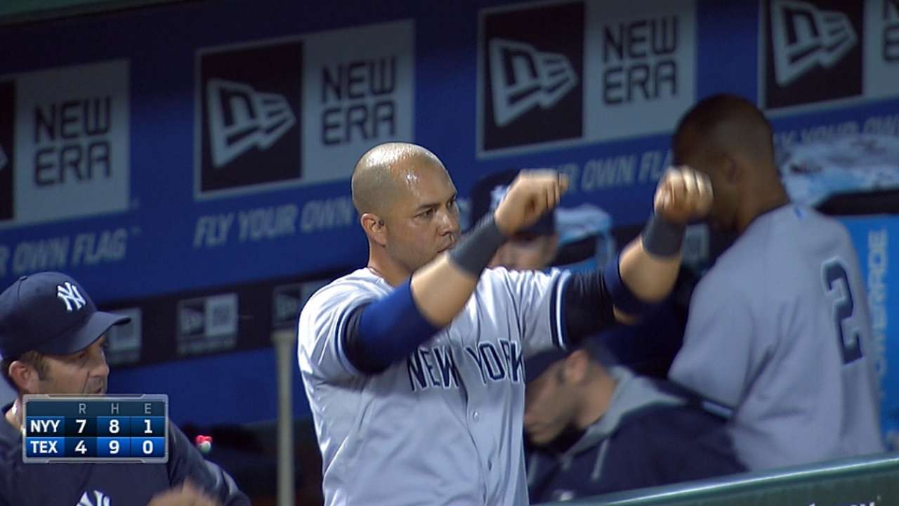 Seven-run sixth helps Yanks hold off Rangers