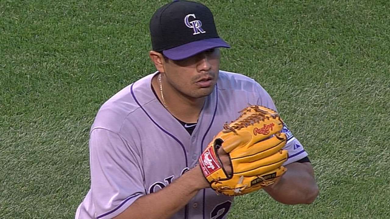Rockies battle for 16 but drop marathon to Cubs