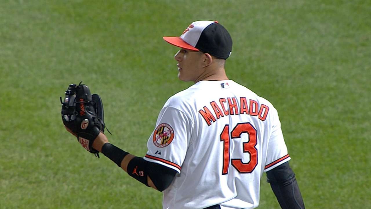 Machado throws Pujols for a loop again