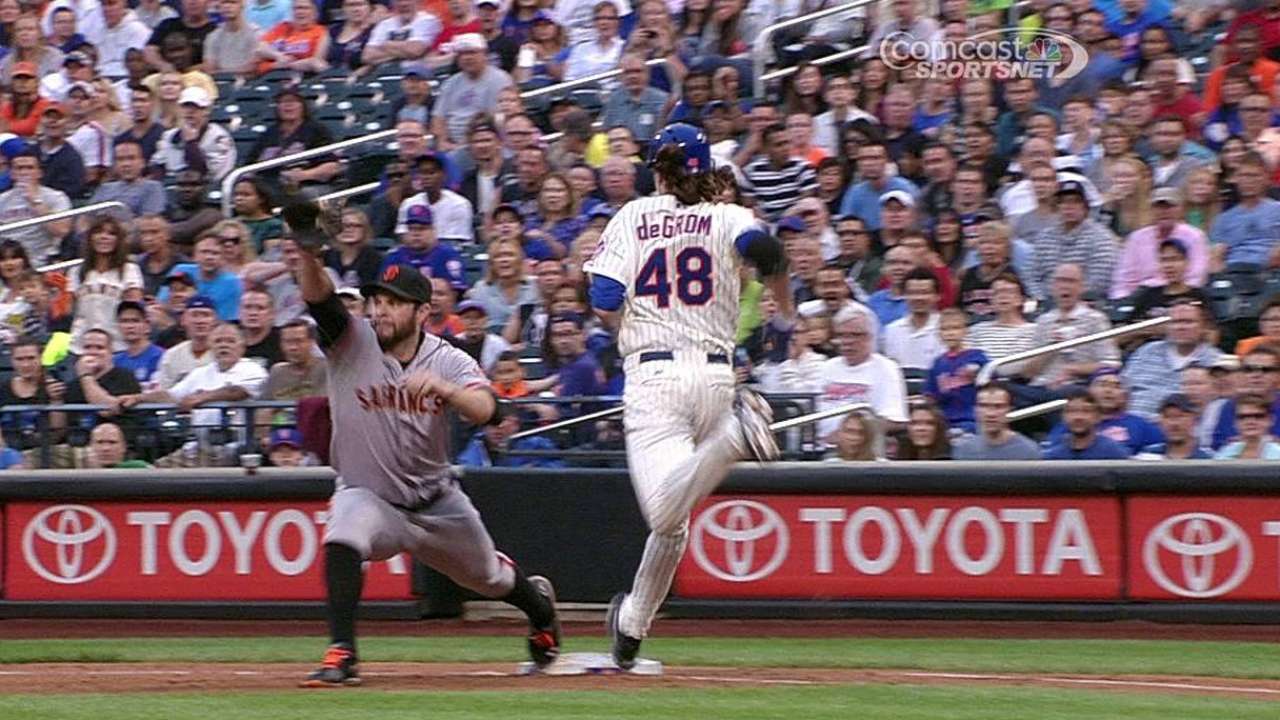 Giants win challenge on call at first base in third