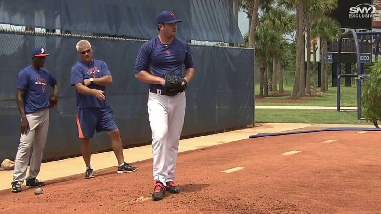 Harvey takes rehab to Florida, throws bullpen session