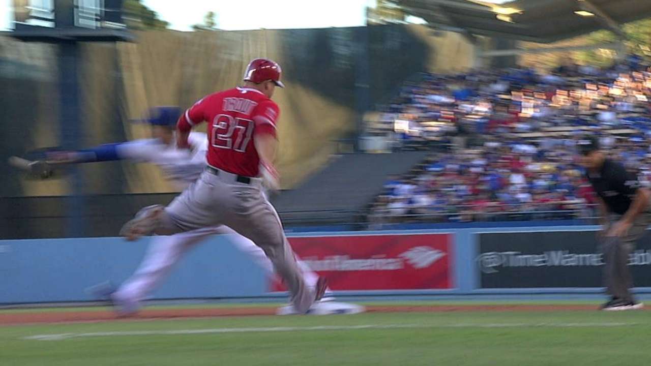 Trout keeps infield hit off Kershaw despite challenge