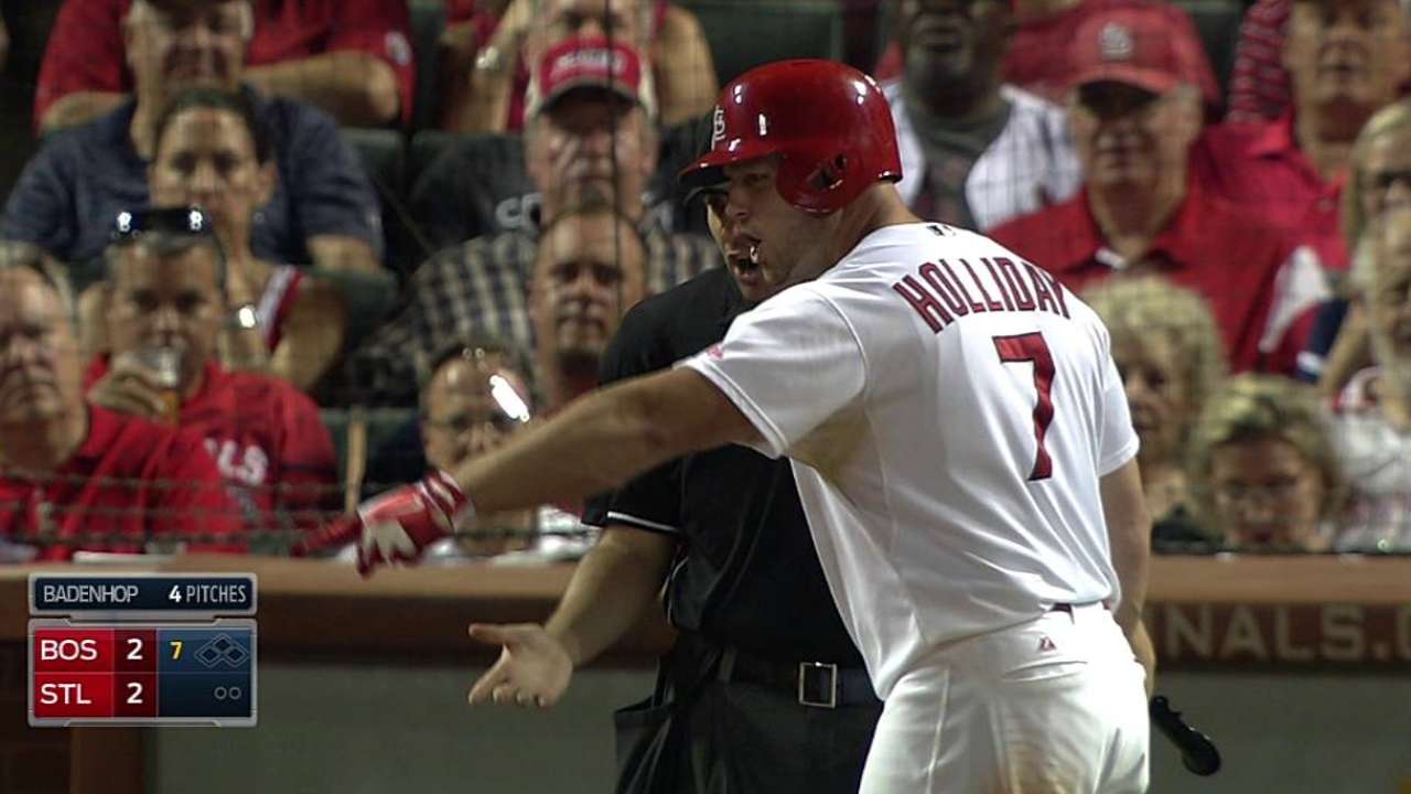 Holliday tossed after arguing strike call