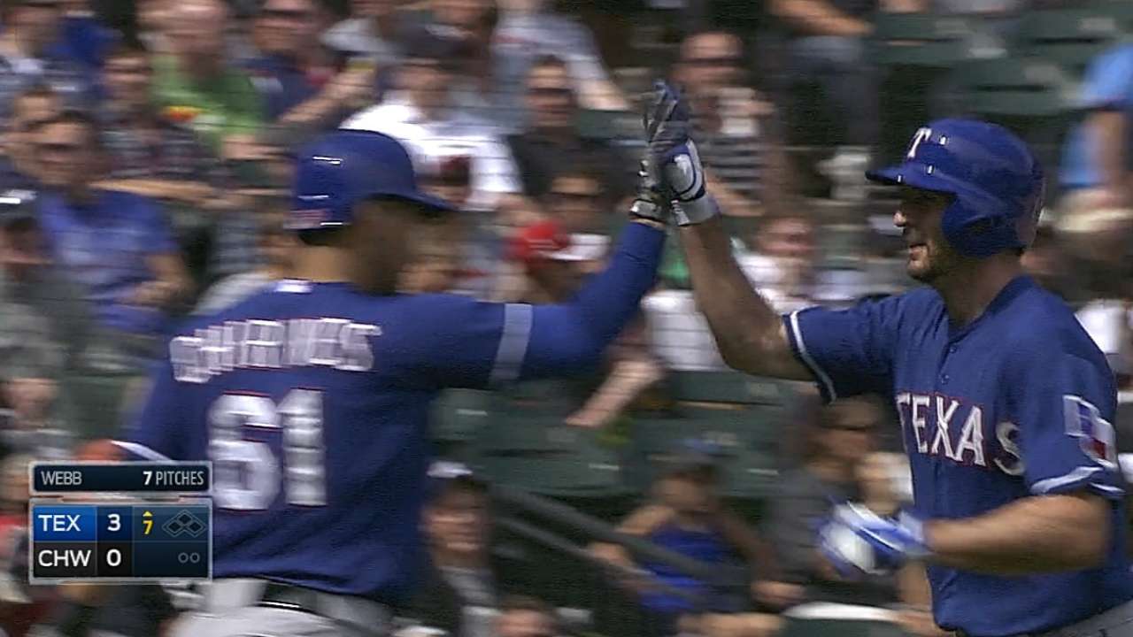 Rosales belts pair of homers to pace Texas in finale