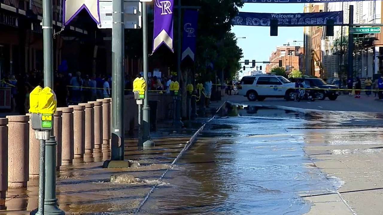 Broken water main near Coors postpones game
