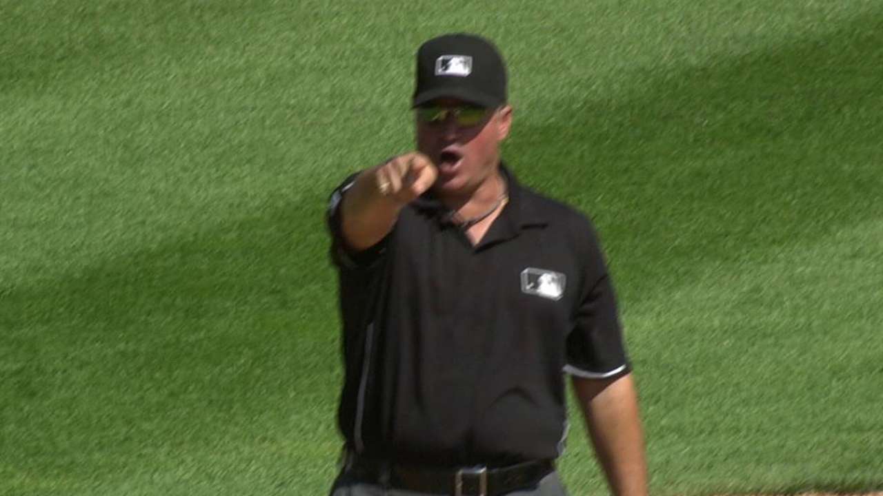 Gesture from dugout gets McClendon tossed