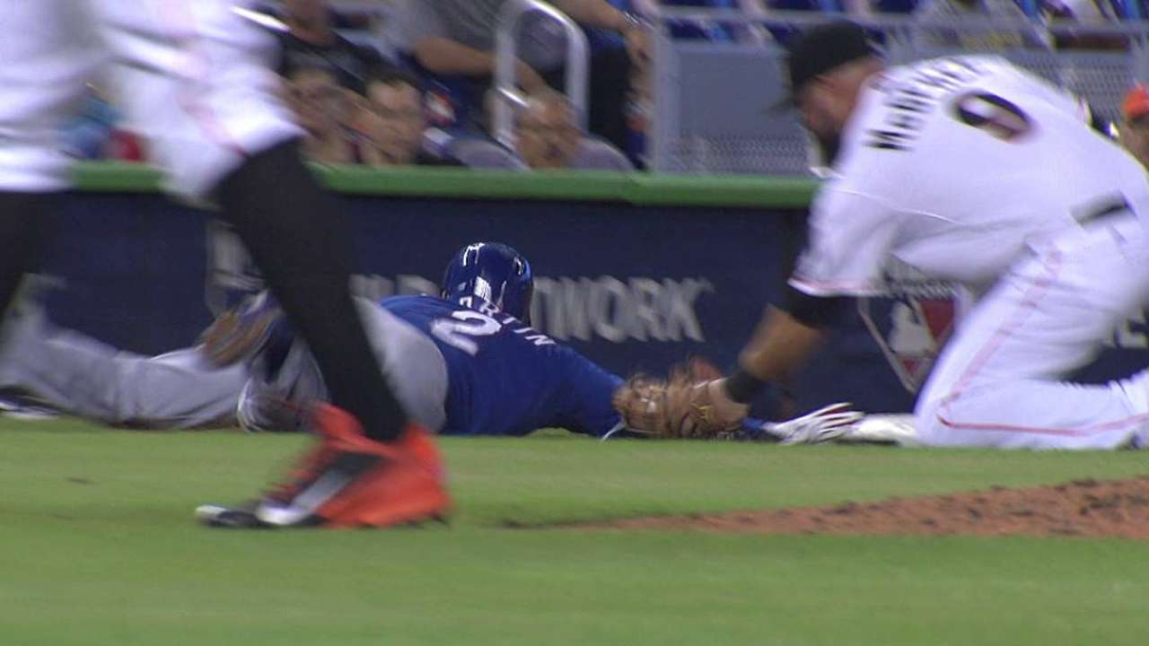 Marlins turn key double play after challenge