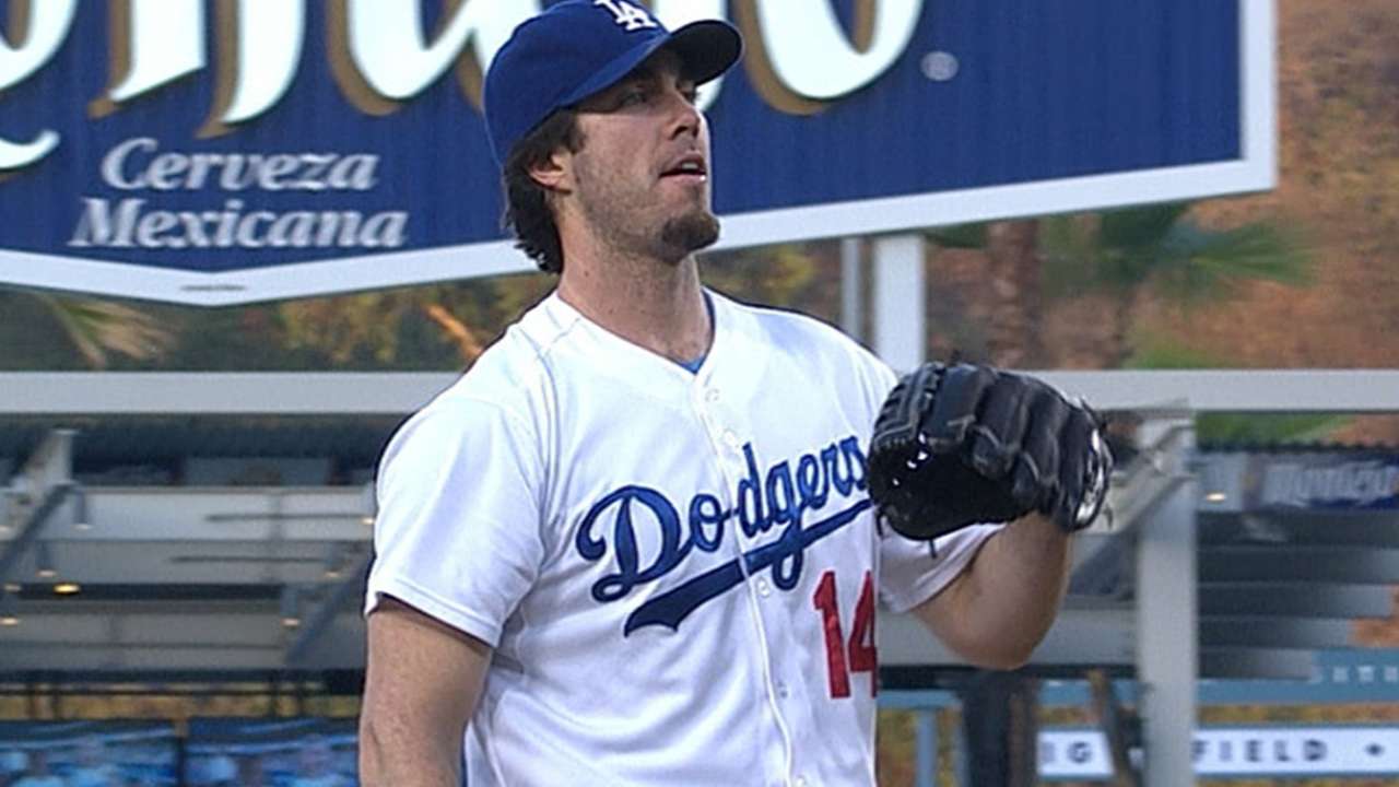 Dodgers maintain lead behind Haren's stellar start