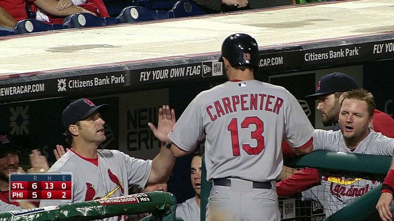 Extra-innings win puts Cards half-game out of first
