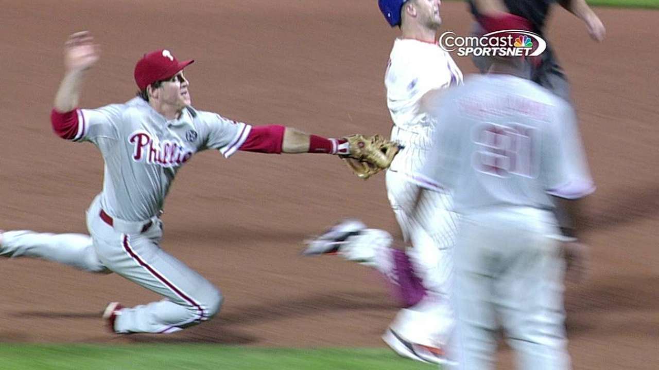 Phils get safe call overturned, complete double play