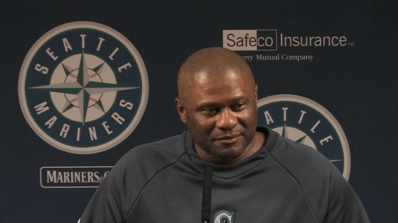 Ackley drives in four to help Mariners in WC race