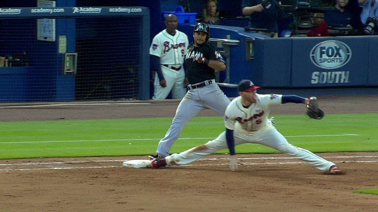Marlins challenge, but close call goes to Braves
