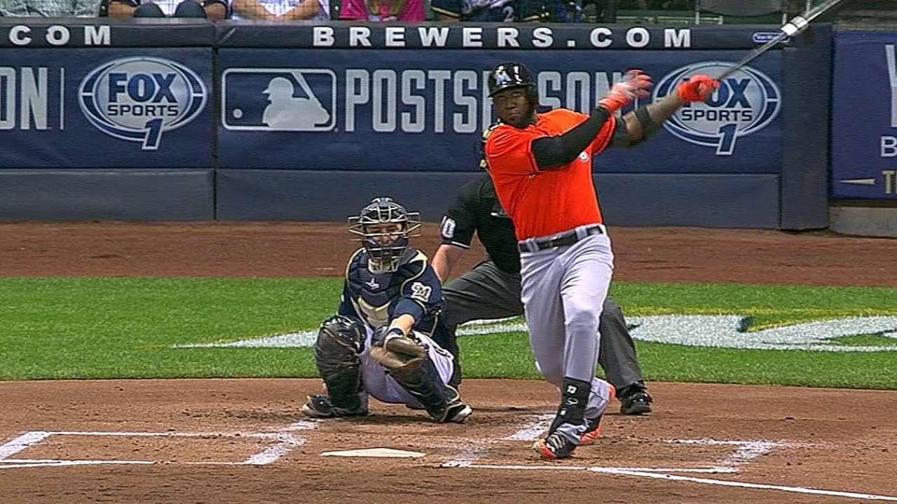 Marlins crush three homers, stay in postseason mix