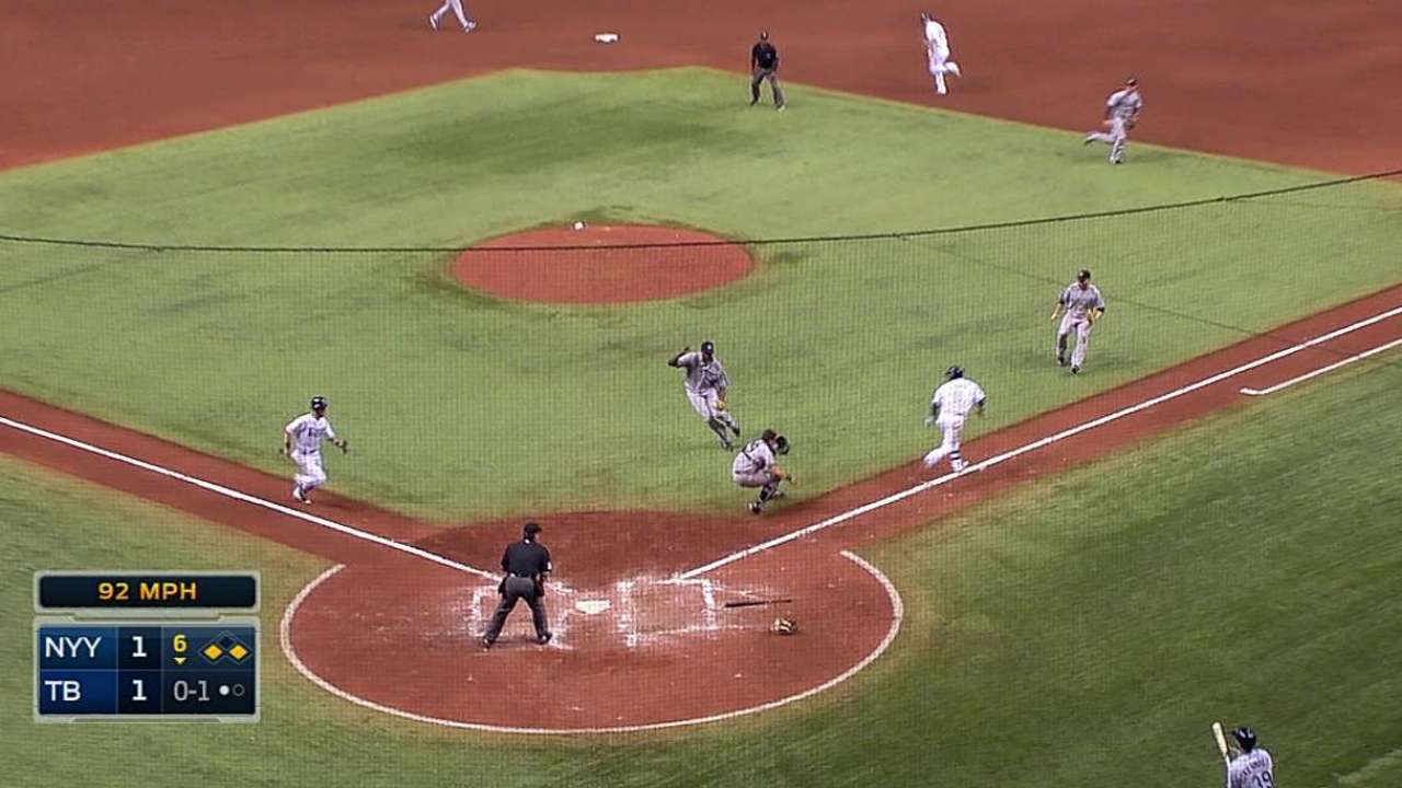 Rays open floodgates on Yanks after close call