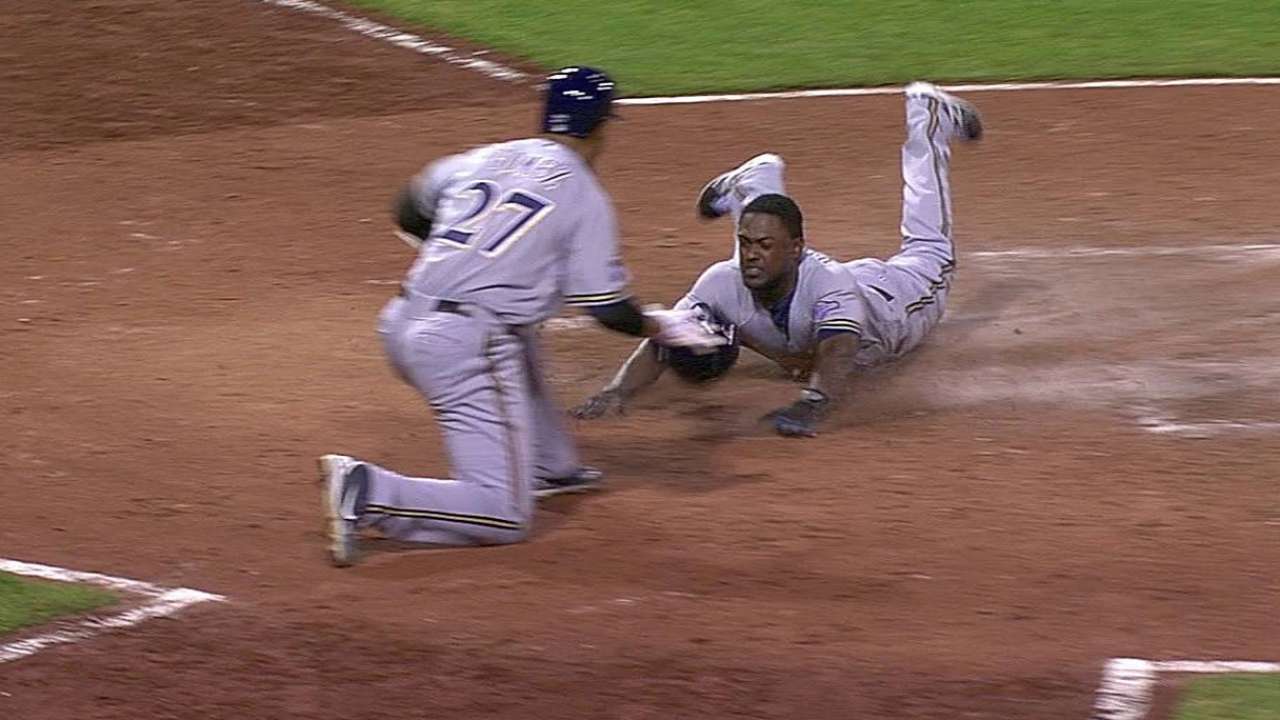 Schafer's sac fly in ninth helps Crew gain on Bucs