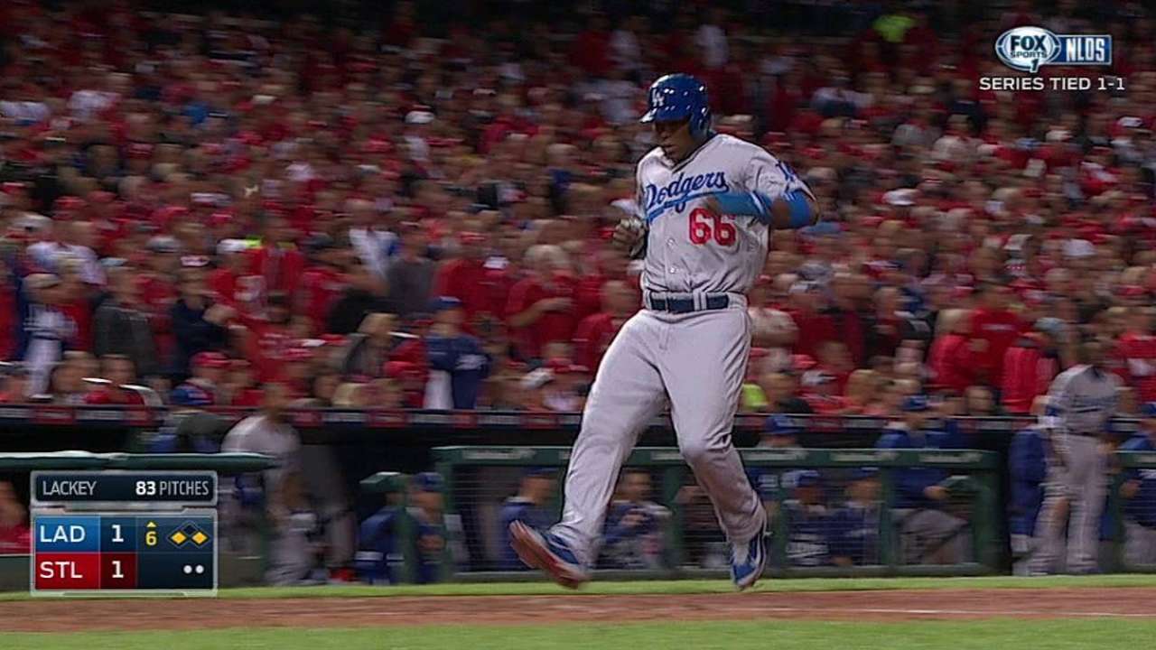 Puig's triple snaps stretch of seven straight strikeouts