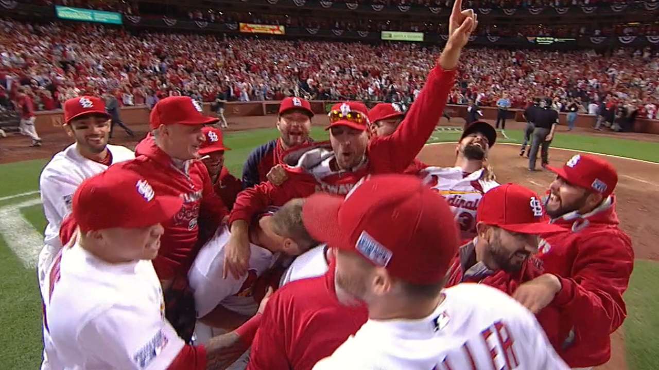 Title chase down to four as Cards, Giants roll on
