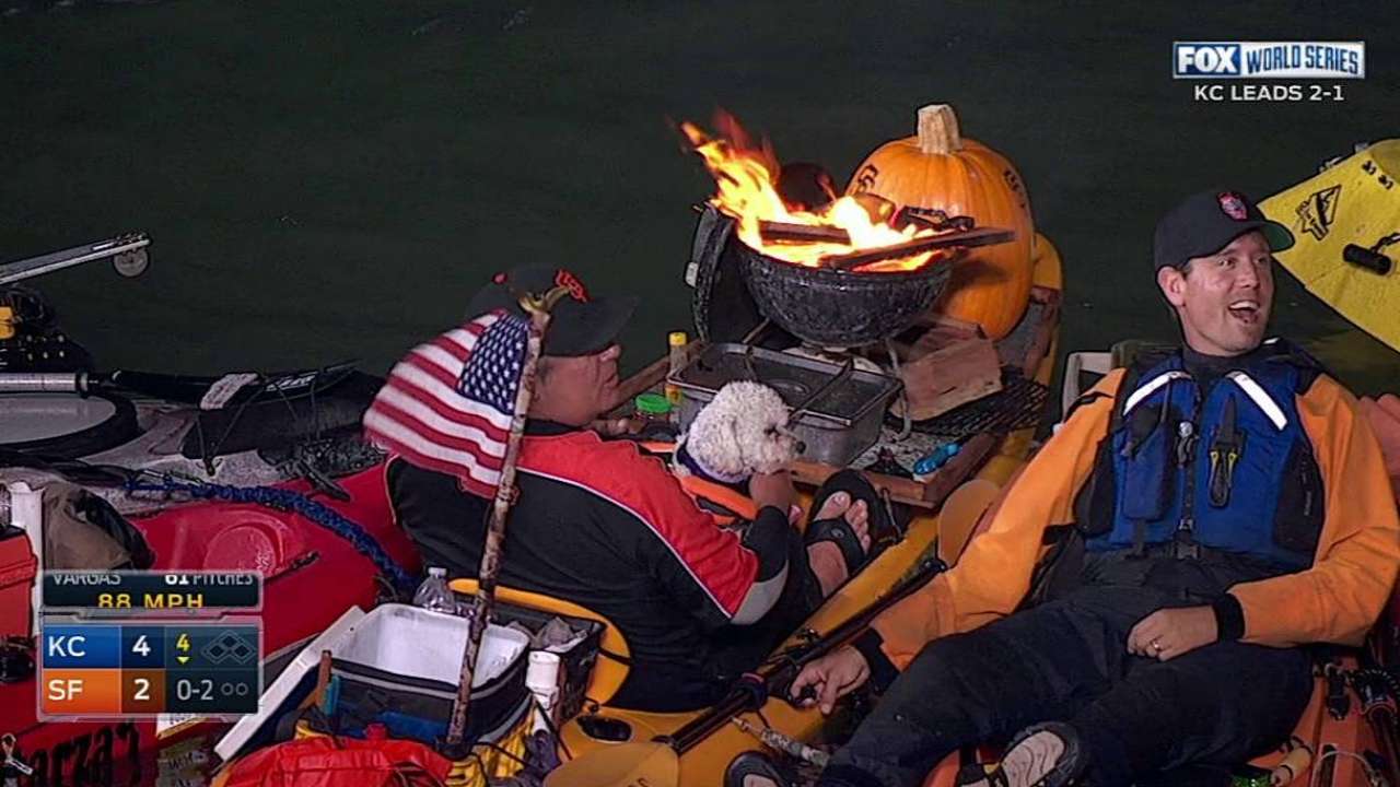 Fan takes in game in style