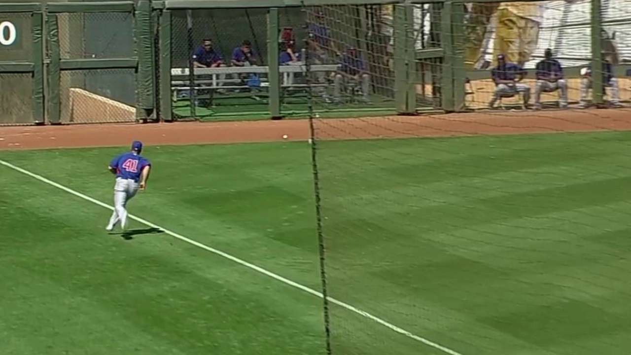 Rangers rap 16 hits in split-squad loss to Cubs