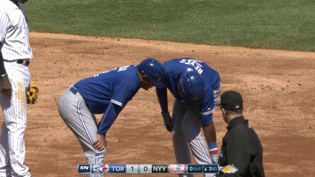 Reyes 'all good' after scare at first base in opener