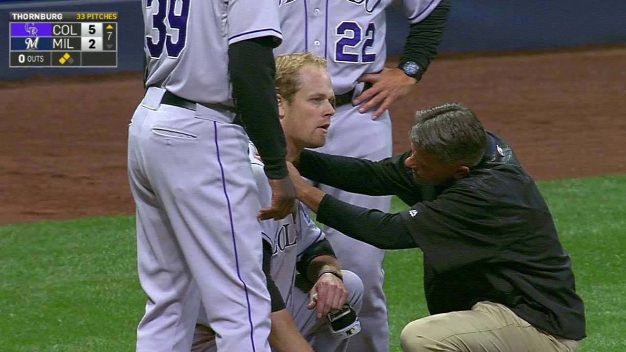 Morneau shaken up after slide