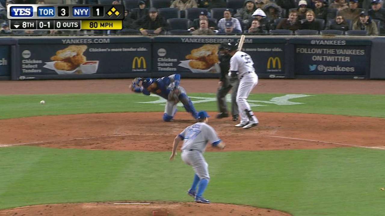 Young scores on wild pitch
