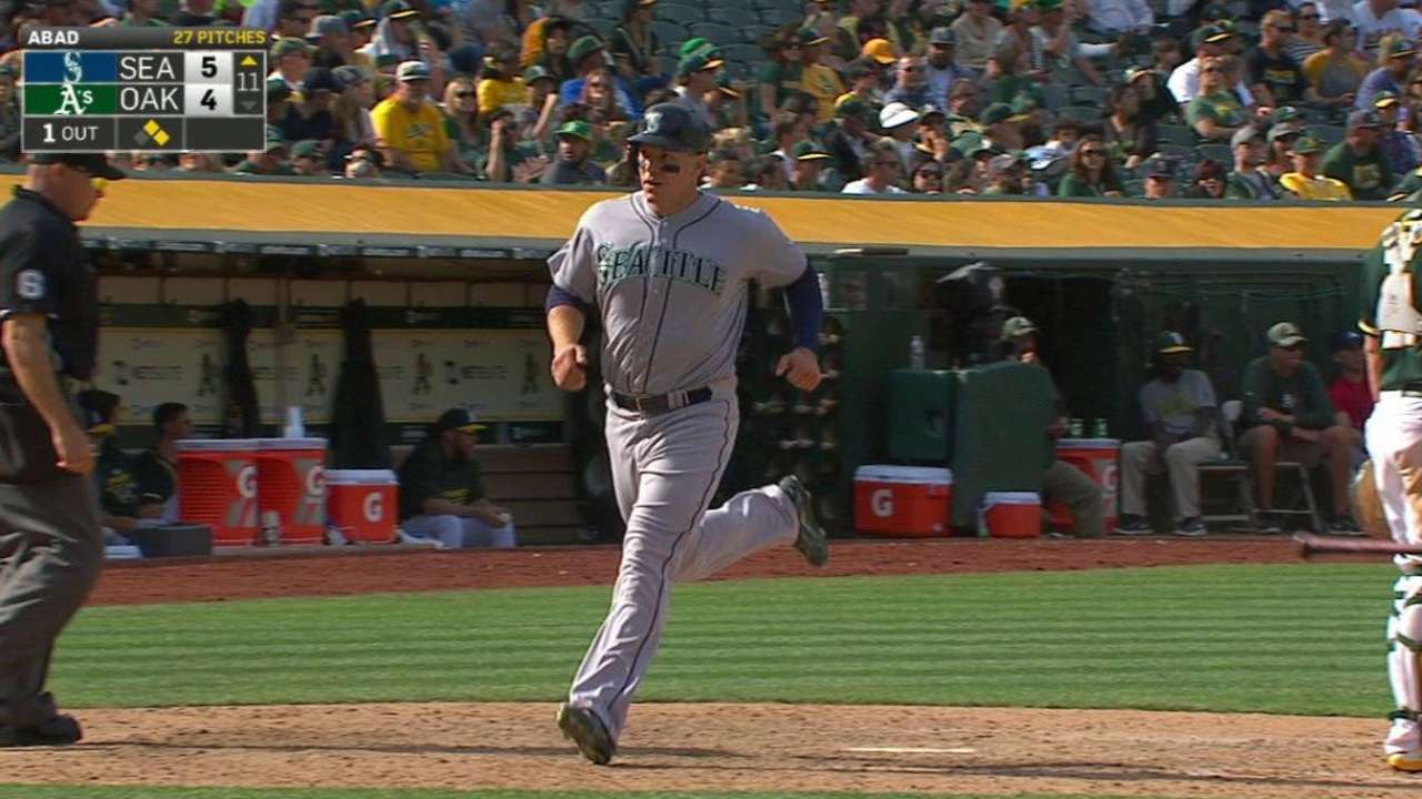 Miller lifts Mariners over A's in 11th; Cruz homers