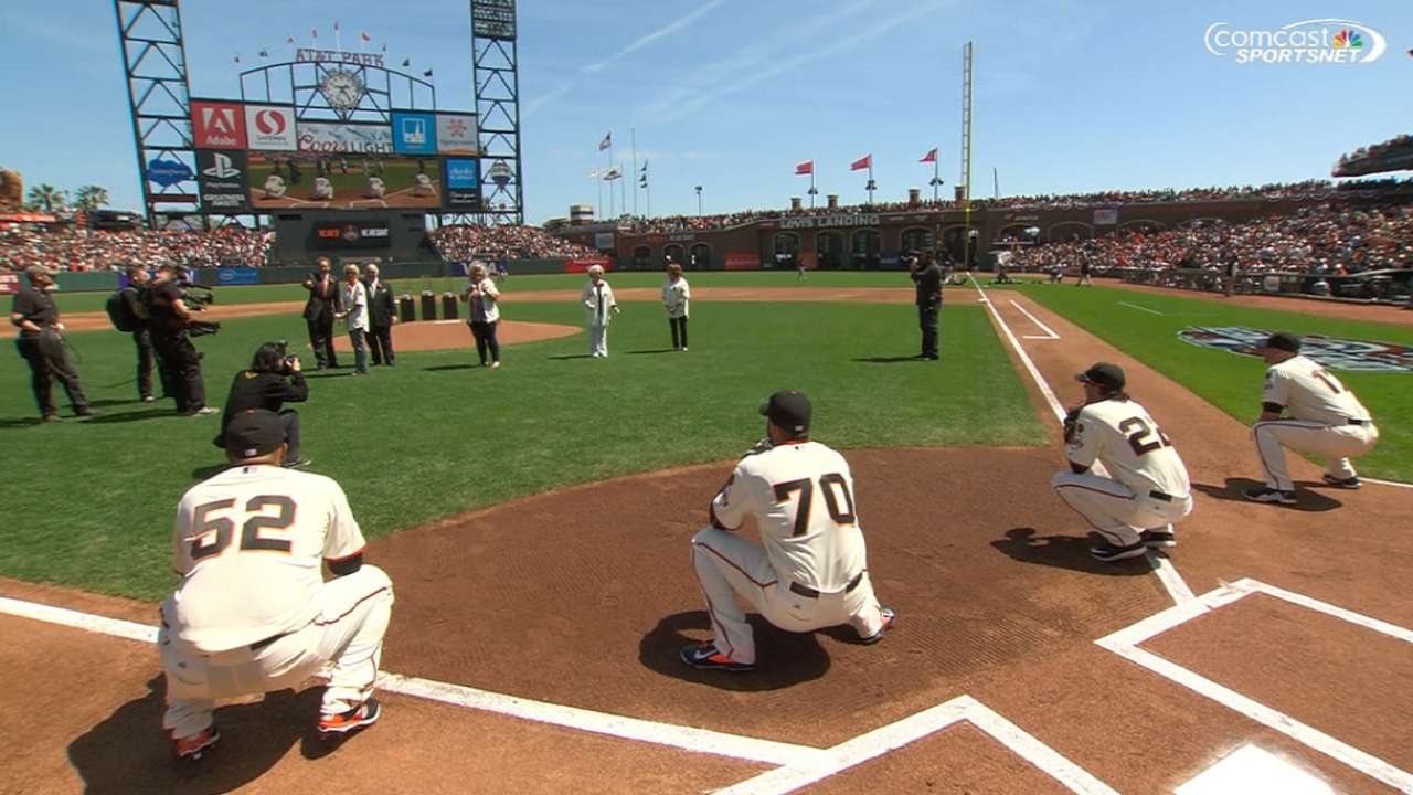 Simmons' daughters throw pitch
