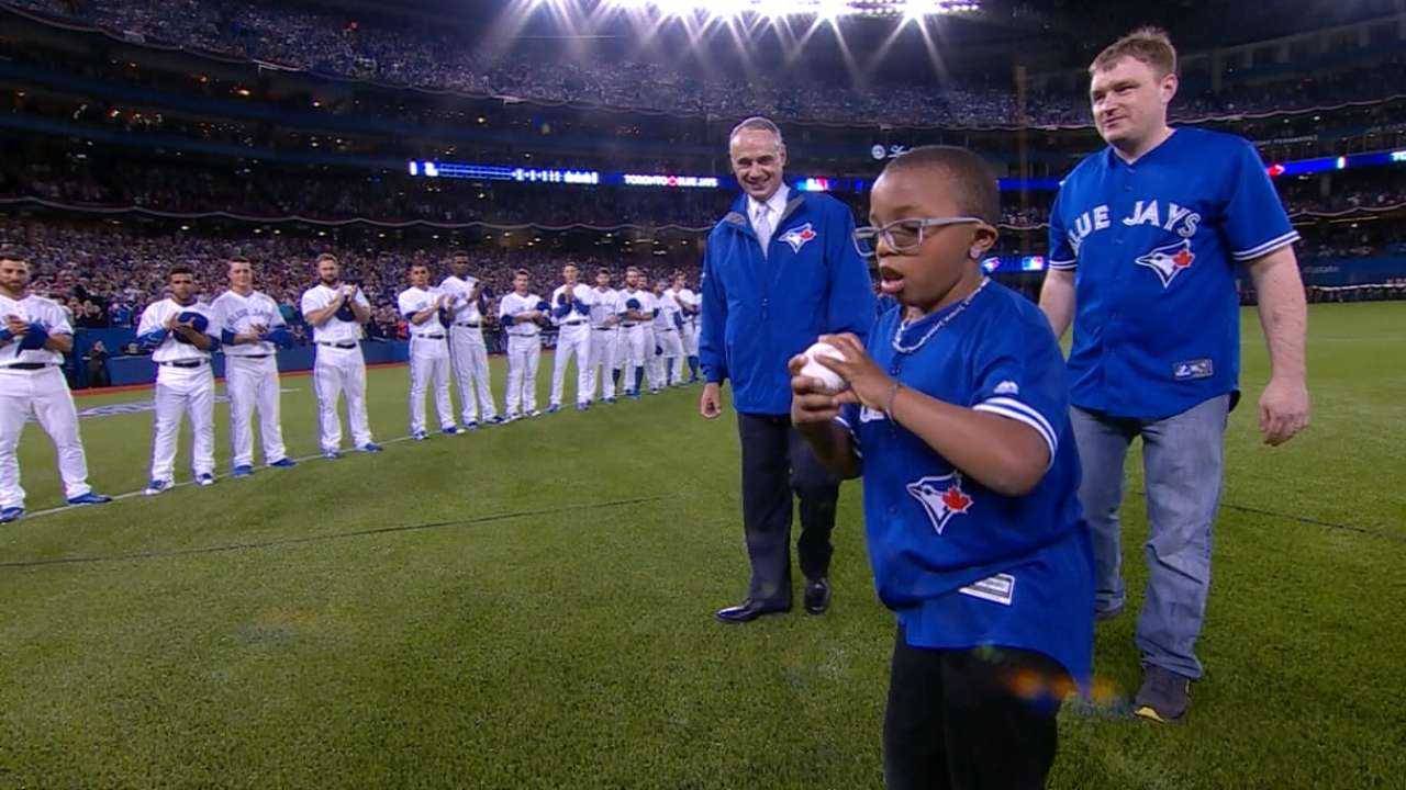 Manfred hands off first pitch