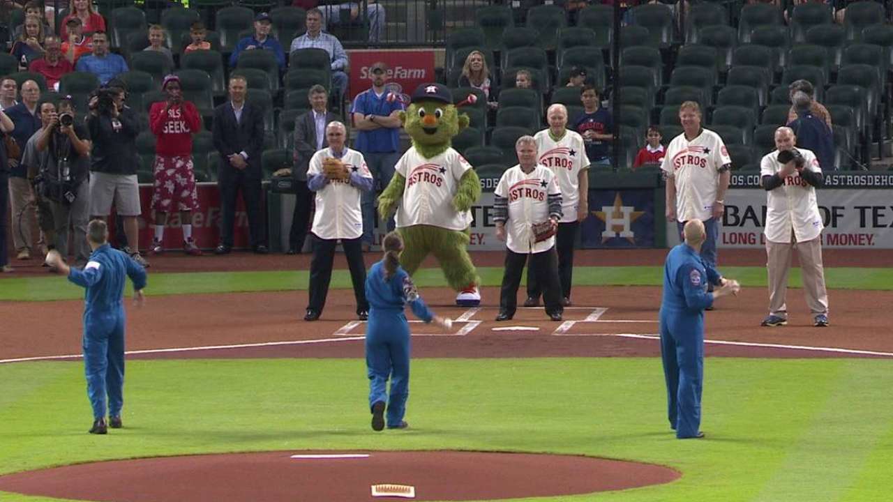 Astronauts throw out first pitch