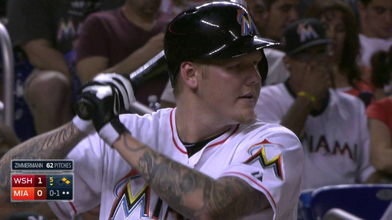 Latos' RBI single ties game