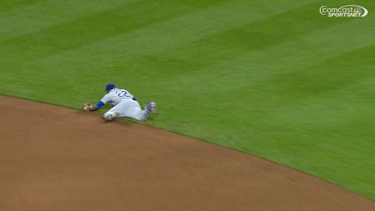 Russell makes diving stop to throw out speedster Hamilton