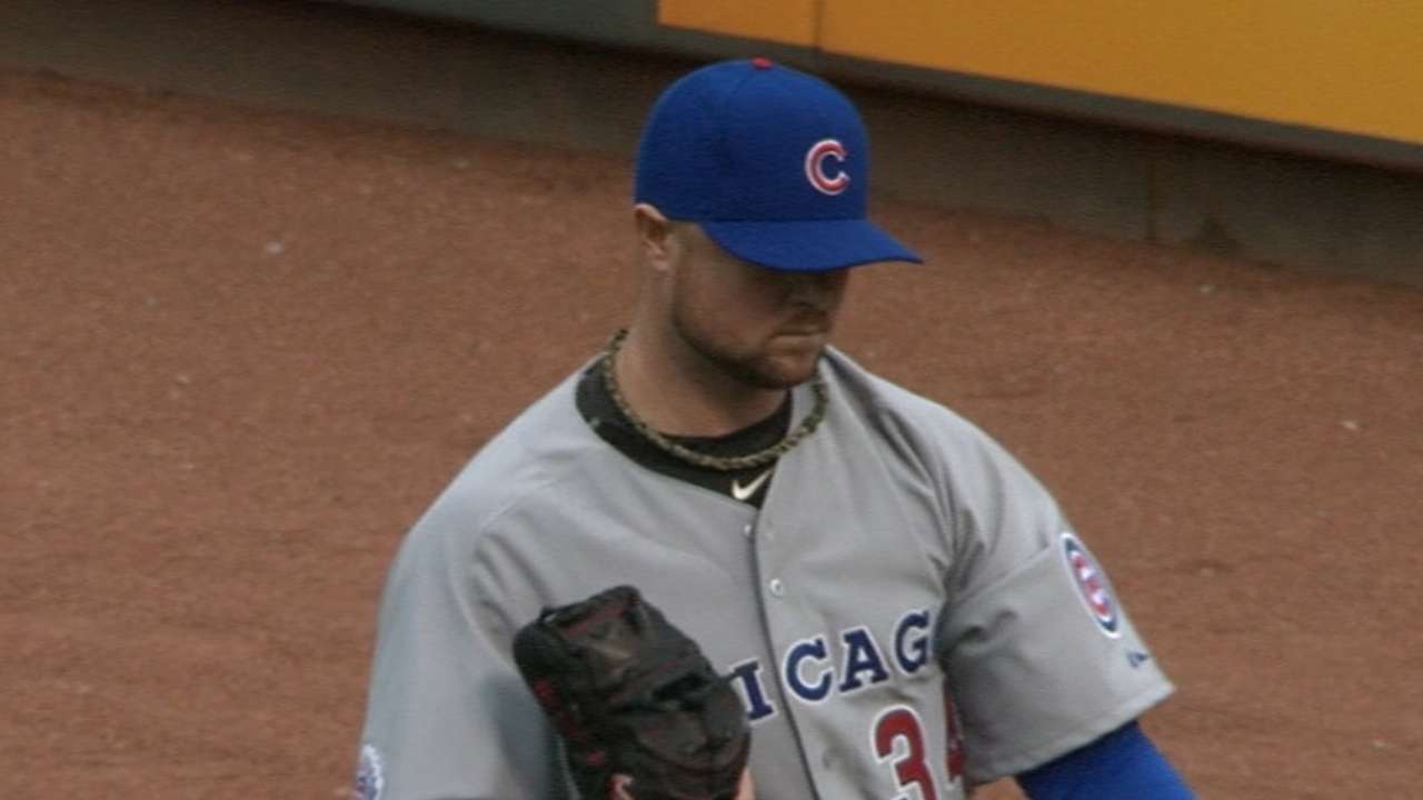 Lester improves, strikes out 10 against Reds