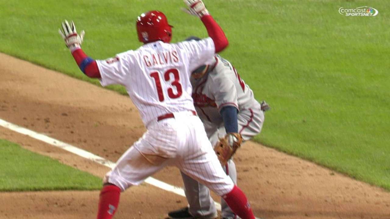 Galvis advances on passed ball