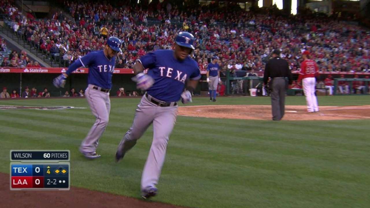 Beltre scores on wild pitch