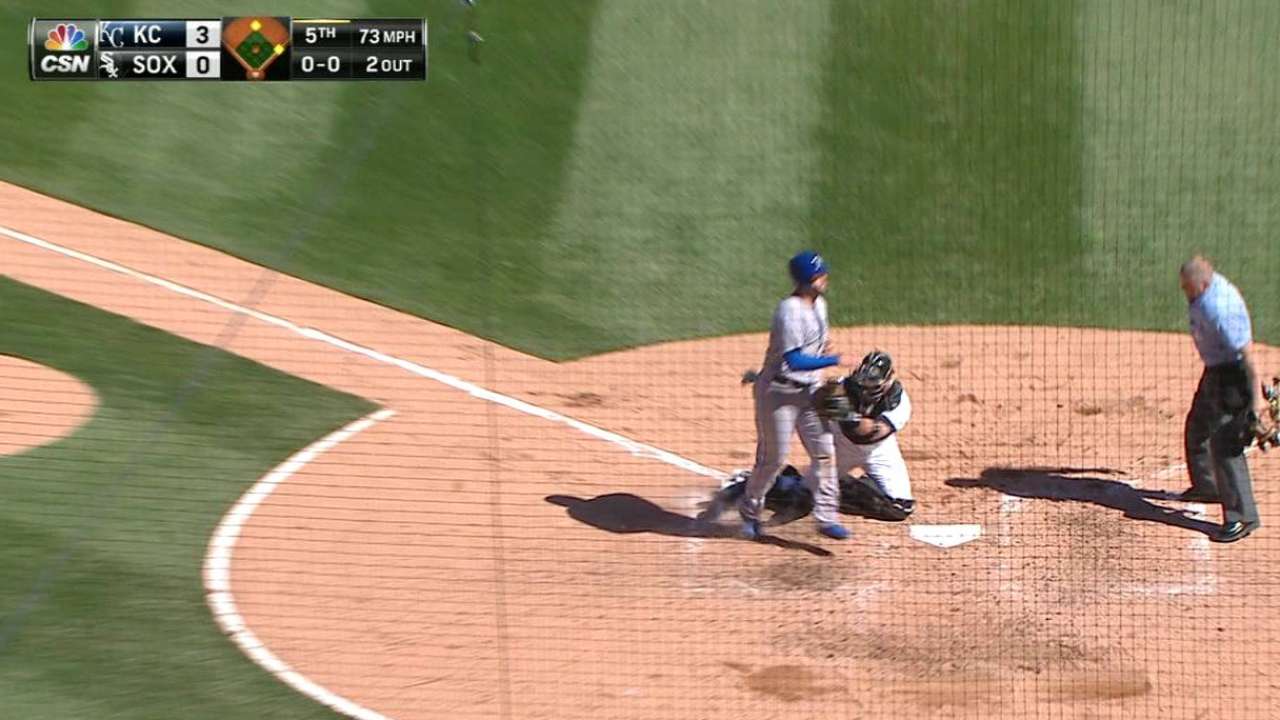 Ramirez throws out Moustakas