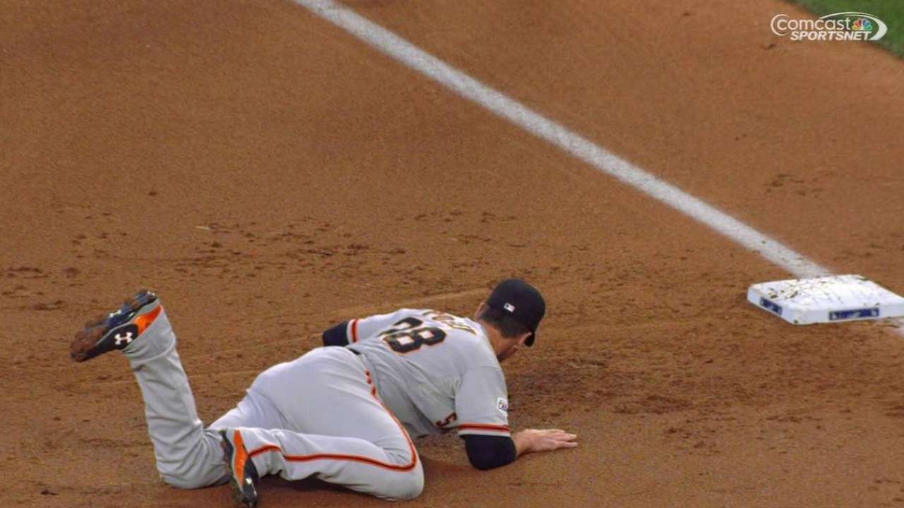 Posey's grab helps turn two
