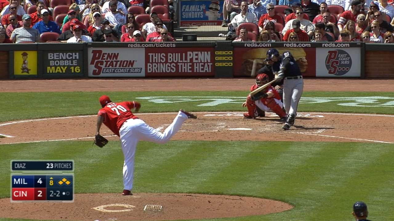 Braun's grand slam helps Crew put away Reds