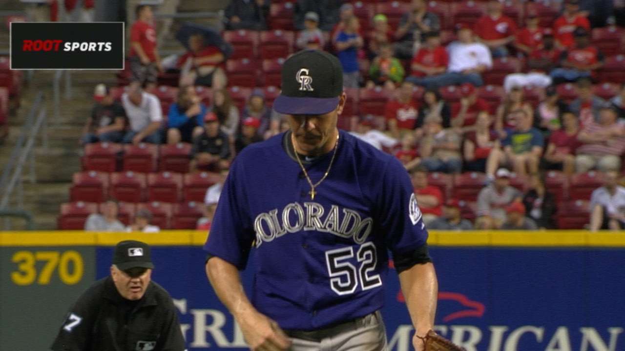 Rusin steps in for gutsy start in Rockies debut