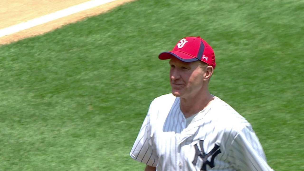 St. John's coach Mullin throws first pitch