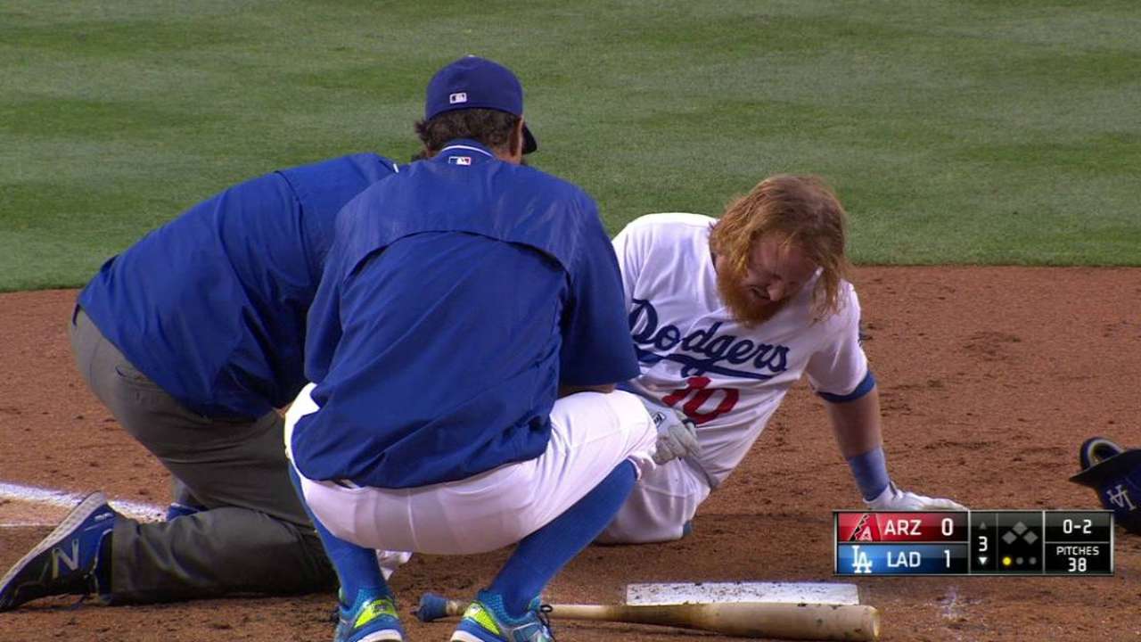 Turner exits after fouling pitch off knee