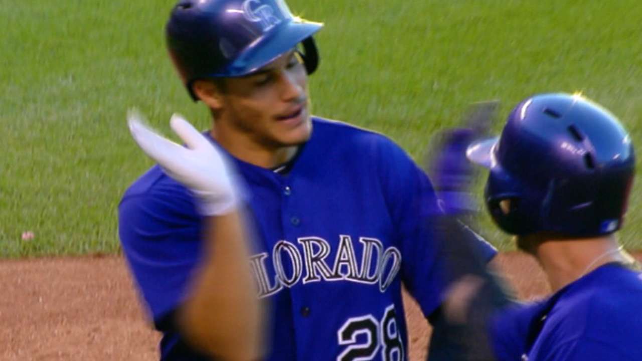 Rockies score five in the 4th