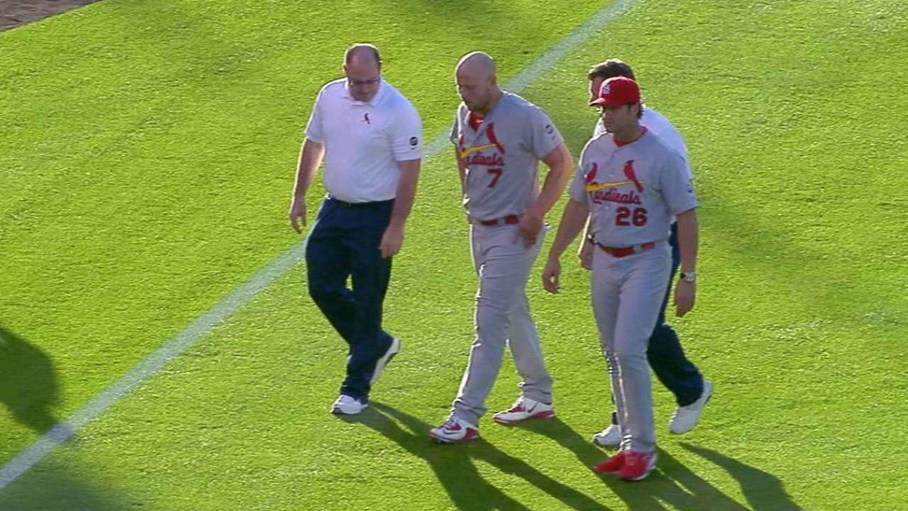 Cards send Holliday to DL with quad strain